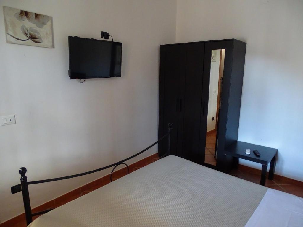 Televízia a/alebo spoločenská miestnosť v ubytovaní B&B Villa Matari