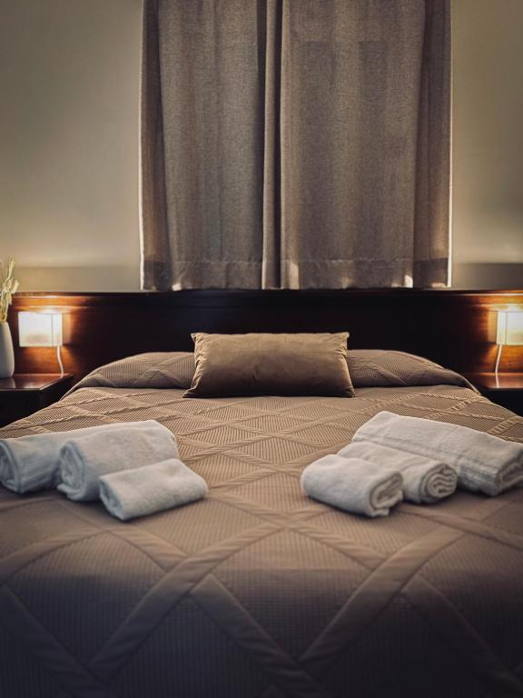 Postel nebo postele na pokoji v ubytování Freya Rooms