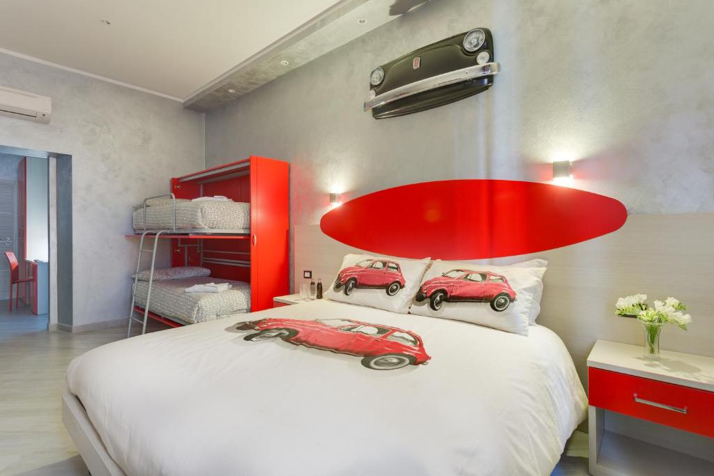 Postel nebo postele na pokoji v ubytování Excellence Suite