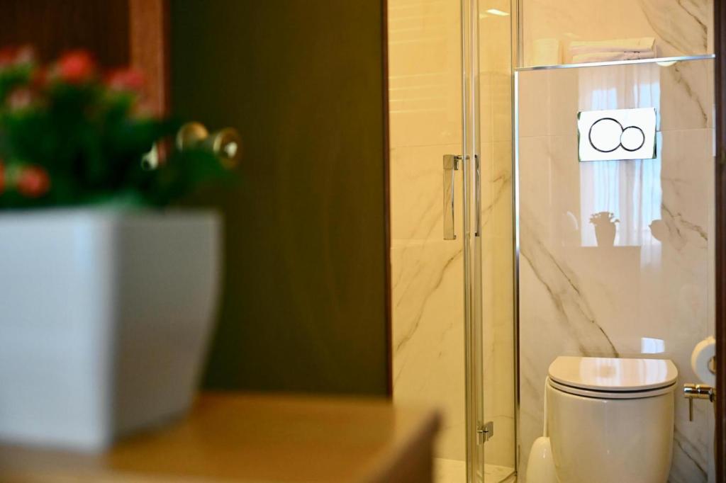 Koupelna v ubytování Hotel Roma Assisi