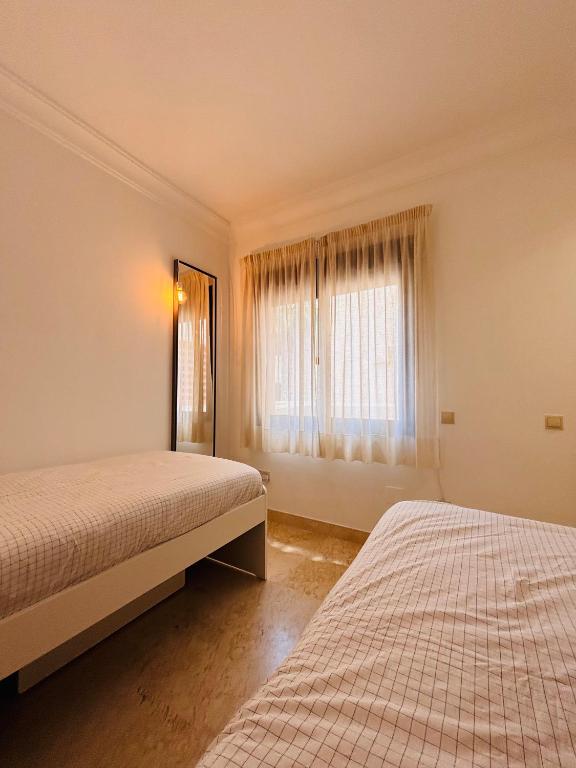 Un ou plusieurs lits dans un hébergement de l'établissement La Cabaña Roda Golf Sol