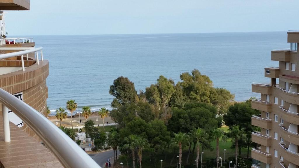 a view of the ocean from the balcony of a building at Vistasmar Primera Linea in Oropesa del Mar