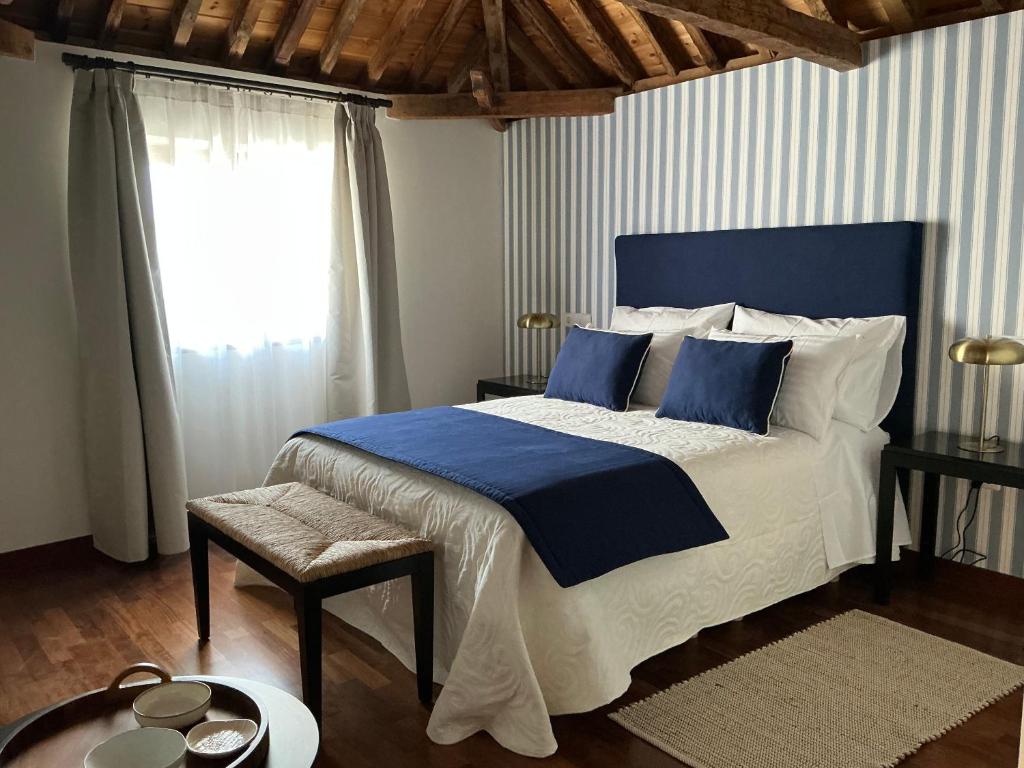 Postel nebo postele na pokoji v ubytování Casón del Conde
