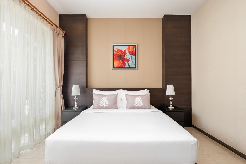 Postel nebo postele na pokoji v ubytování Luxury Pool villa C16 / 4BR 8-10 Persons
