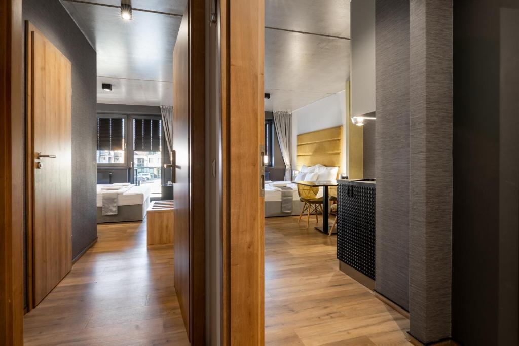 Postel nebo postele na pokoji v ubytování R31 Residence