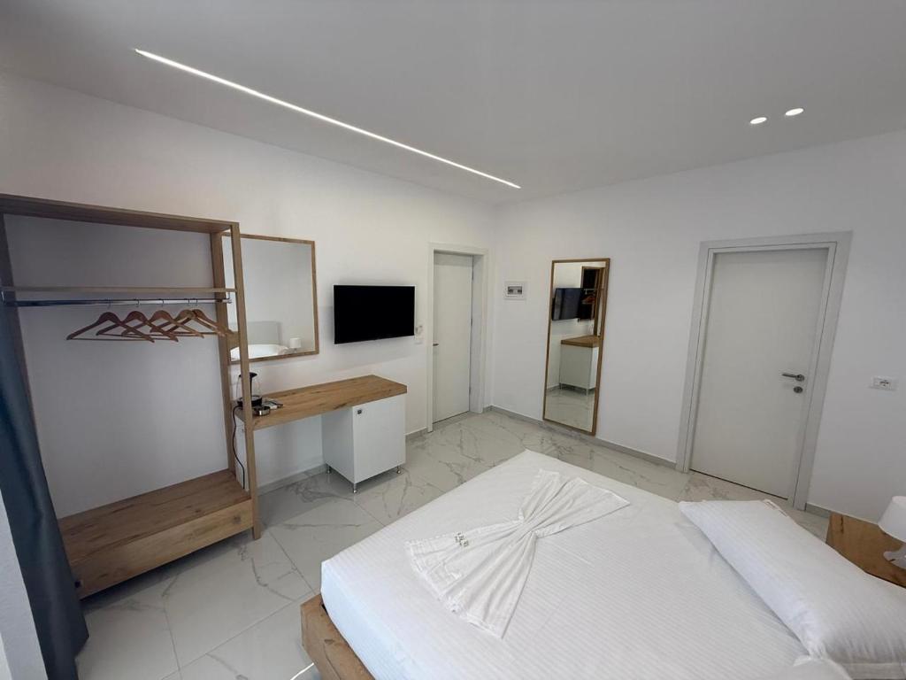 Postel nebo postele na pokoji v ubytování Sea Breeze Villa