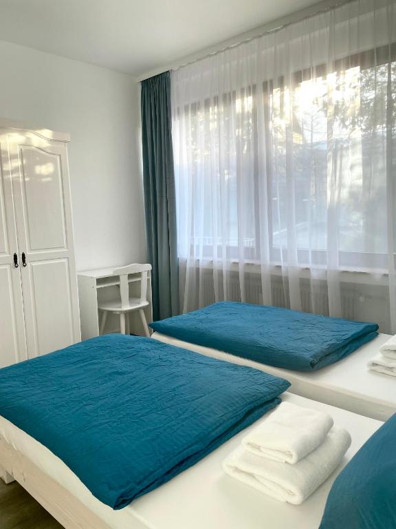 Postel nebo postele na pokoji v ubytování Stay Westend