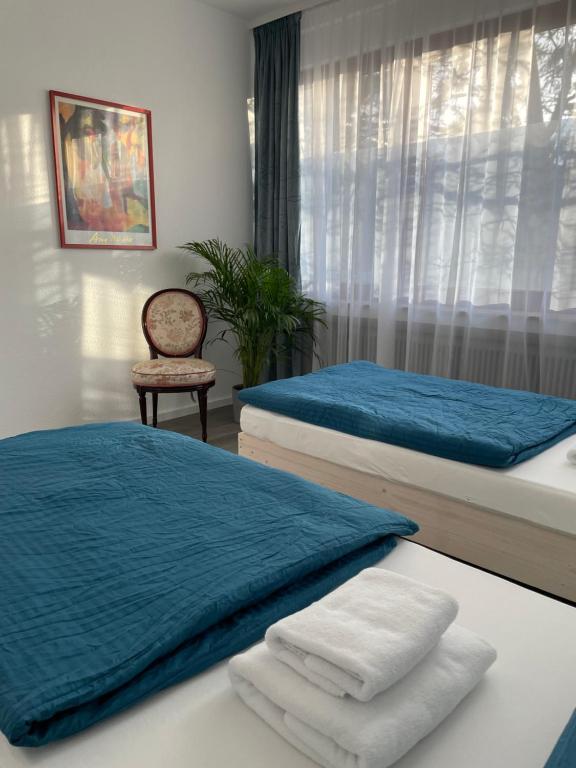 Postel nebo postele na pokoji v ubytování Stay Westend