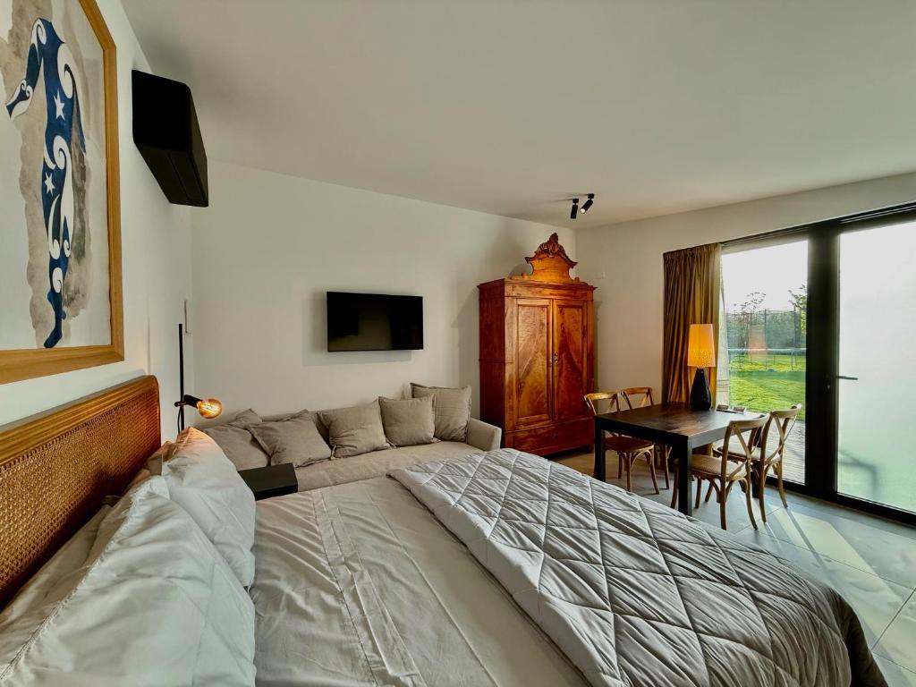 Postel nebo postele na pokoji v ubytování Memento B&B
