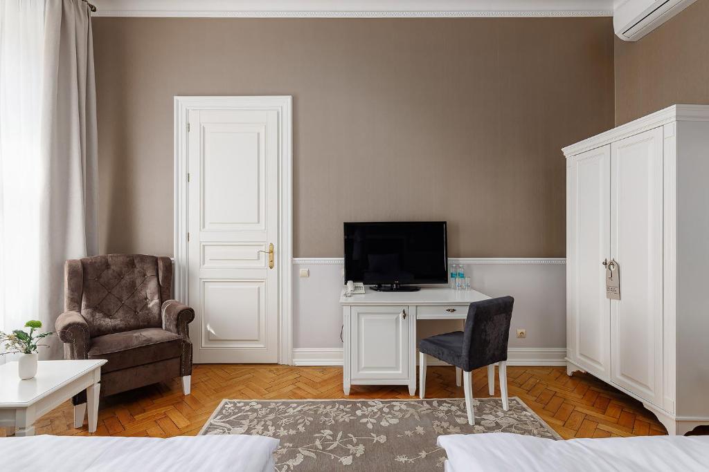 TV a/nebo společenská místnost v ubytování Modern Art Hotel
