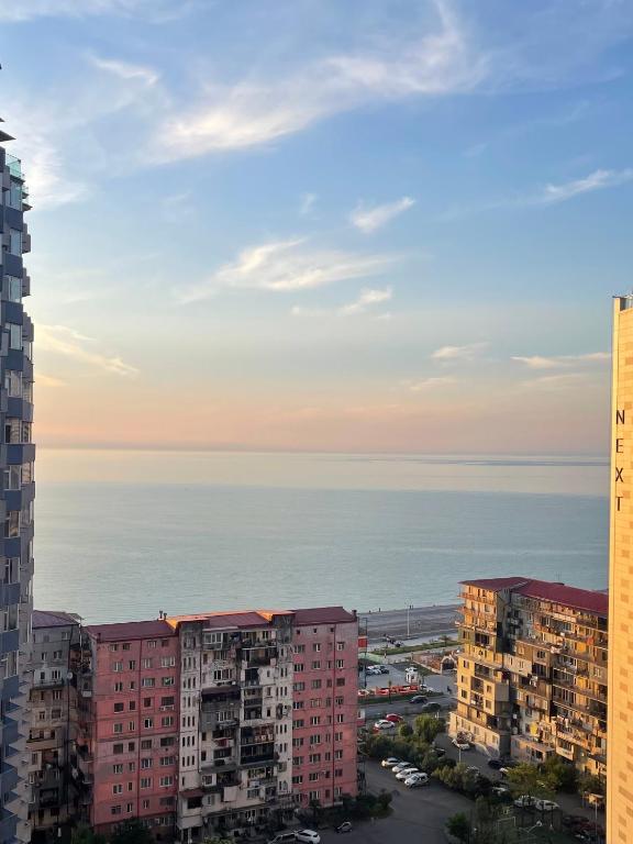 a view of the ocean from a building at Hedi 18 Apartment in Batumi