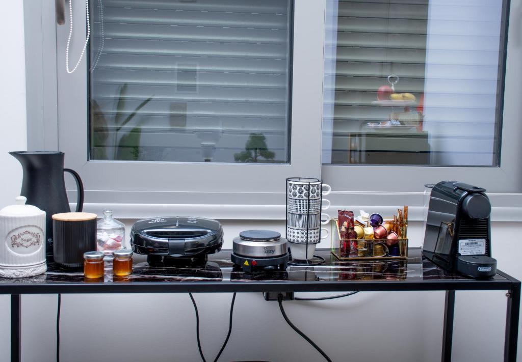 Příslušenství pro přípravu čaje a kávy v ubytování sweet suite