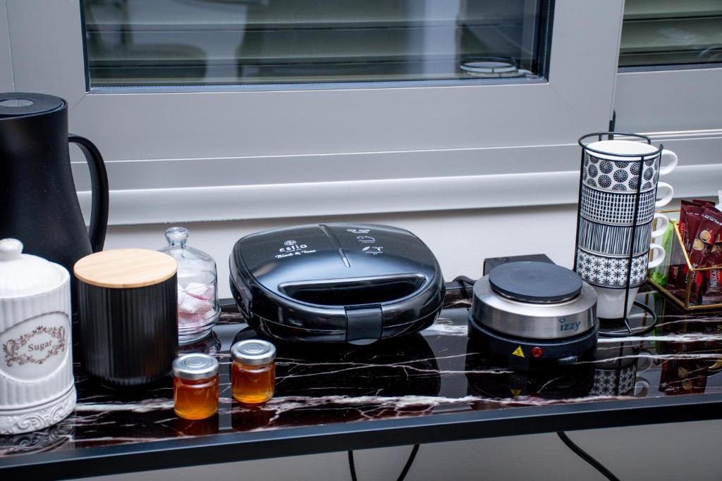 Příslušenství pro přípravu čaje a kávy v ubytování sweet suite