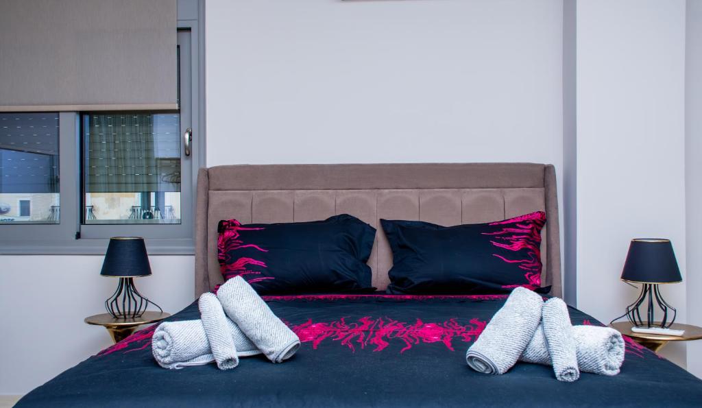 Postel nebo postele na pokoji v ubytování sweet suite