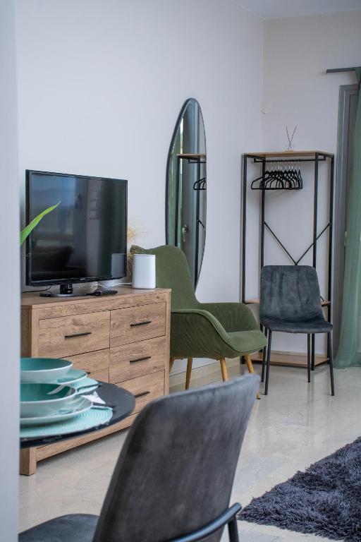TV a/nebo společenská místnost v ubytování sweet suite