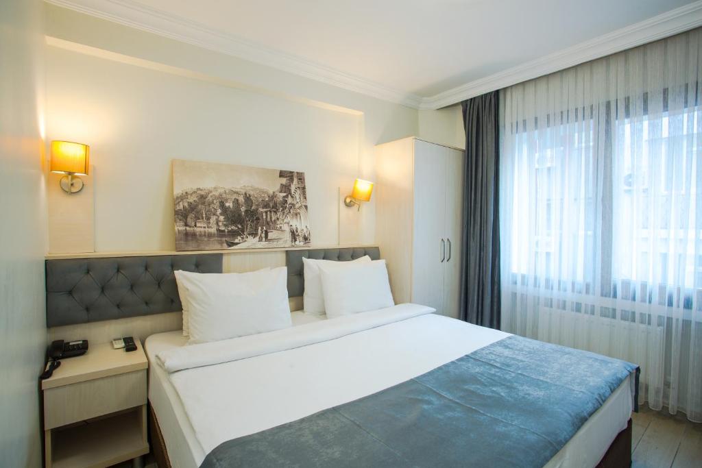 Postel nebo postele na pokoji v ubytování Sim Hotel Istanbul Old City