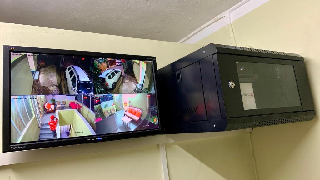 TV a/nebo společenská místnost v ubytování Oasis 1