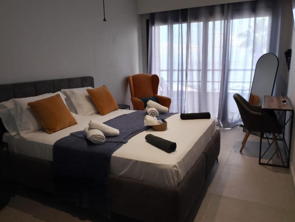 Postel nebo postele na pokoji v ubytování HOTEL ANDREAS