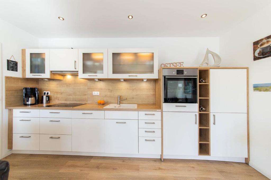 Kuchyň nebo kuchyňský kout v ubytování Ferienwohnung Windjammer