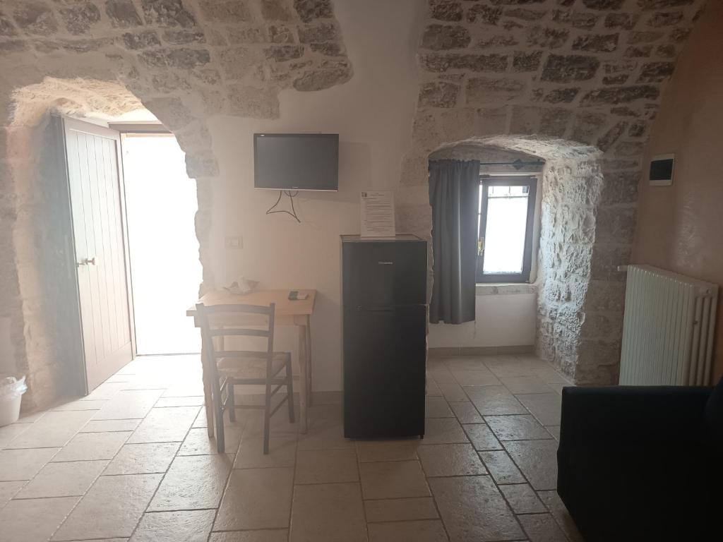 TV a/nebo společenská místnost v ubytování B&B Il Mulino del Monastero