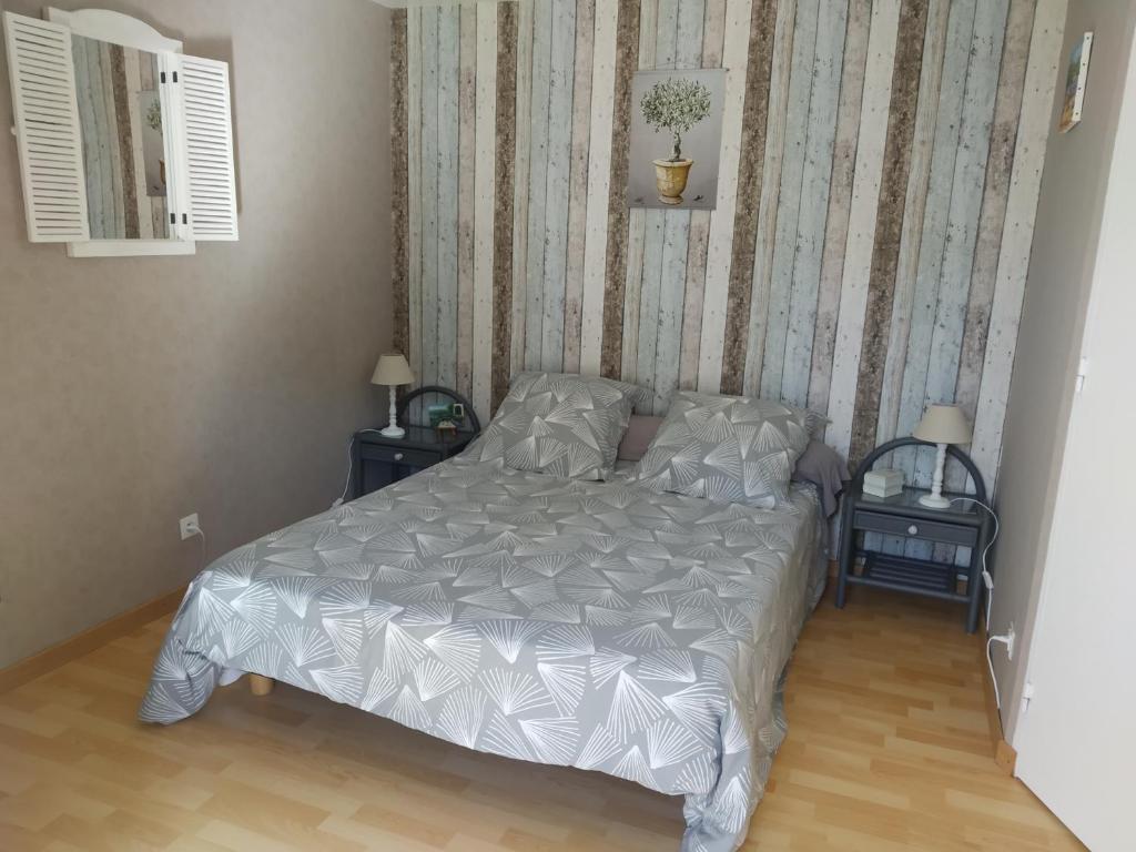 Postel nebo postele na pokoji v ubytování L'éolyre