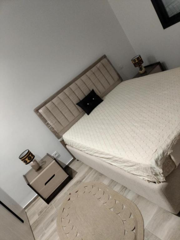 Postel nebo postele na pokoji v ubytování Monastir