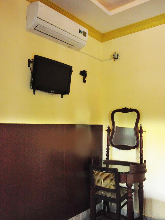 TV a/nebo společenská místnost v ubytování Sajhome Fortkochi, Kochi, Kerala, inda