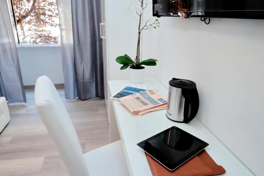 Telewizja i/lub zestaw kina domowego w obiekcie St. Peter Vatican House