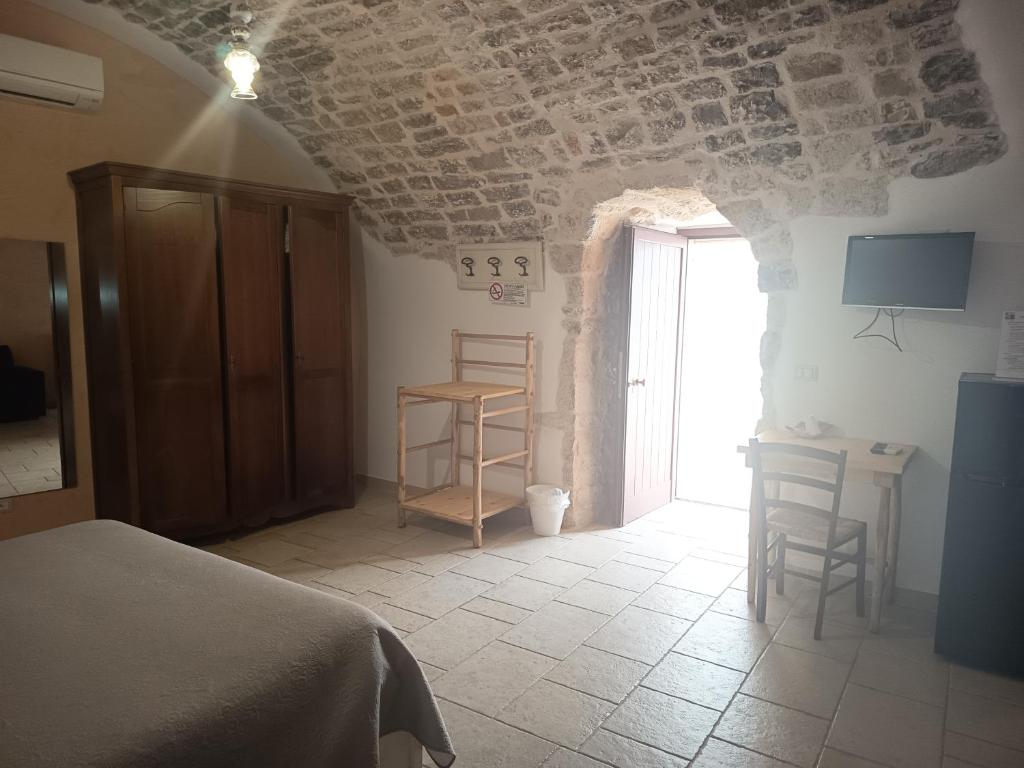 Postel nebo postele na pokoji v ubytování B&B Il Mulino del Monastero