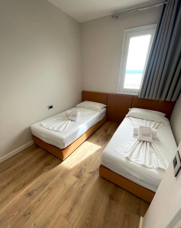 Postel nebo postele na pokoji v ubytování Coral Hotel & Resort