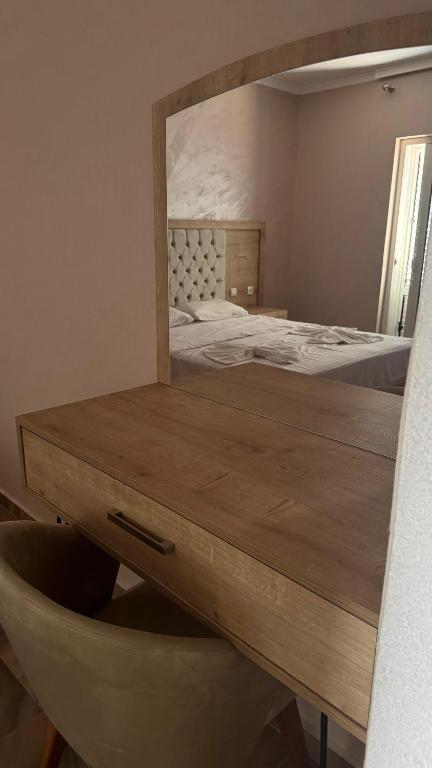 Postel nebo postele na pokoji v ubytování Hotel Biser