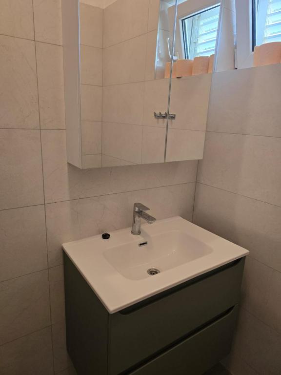 Kúpeľňa v ubytovaní Apartments Sokolović