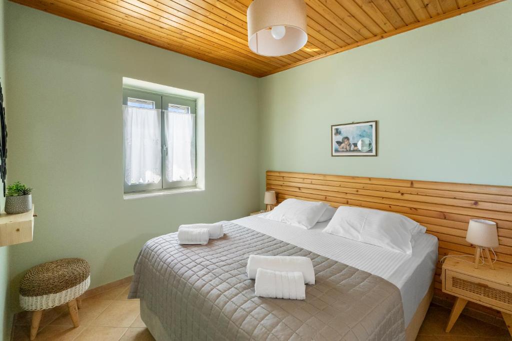 Postel nebo postele na pokoji v ubytování Villa Aurora