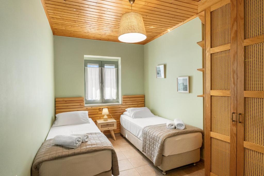 Postel nebo postele na pokoji v ubytování Villa Aurora