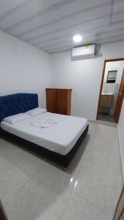 Postel nebo postele na pokoji v ubytování Hotel Glorial