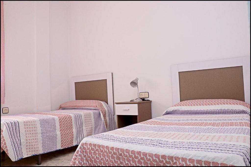 Posteľ alebo postele v izbe v ubytovaní Apartamento luminoso en el centro