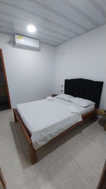 Postel nebo postele na pokoji v ubytování Hotel Glorial