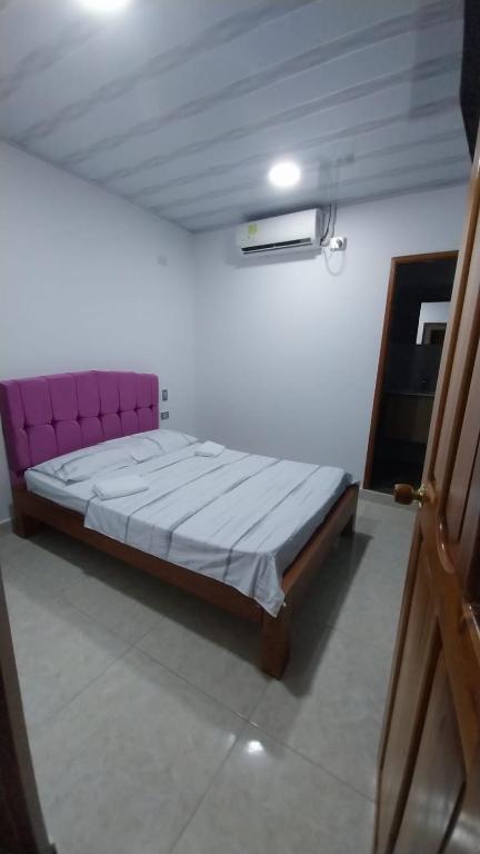 Postel nebo postele na pokoji v ubytování Hotel Glorial