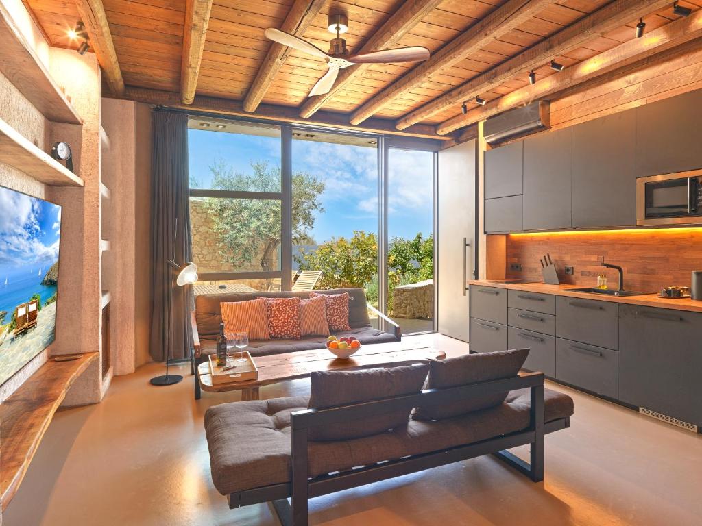 Kuchyň nebo kuchyňský kout v ubytování Sea View Garden Suites