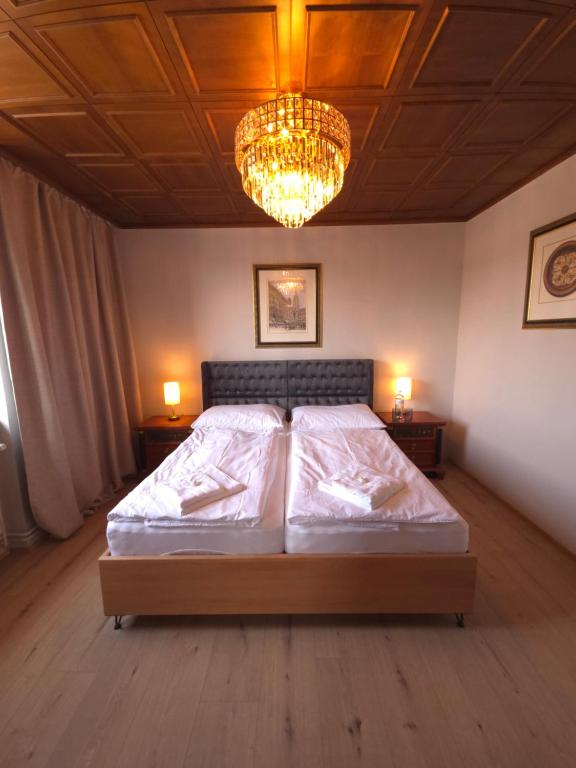 Postel nebo postele na pokoji v ubytování Guesthouse Purbach
