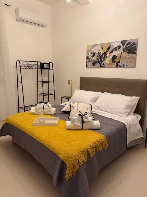 Postel nebo postele na pokoji v ubytování MARIANTONIA Apartment And Rooms