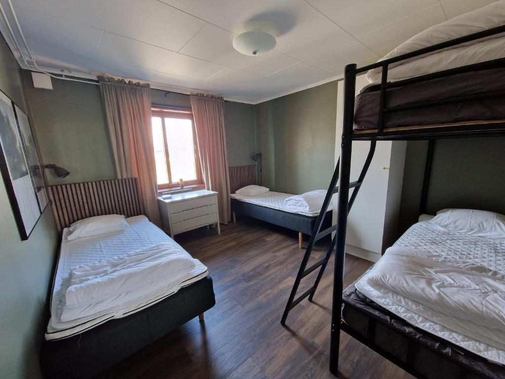 Postel nebo postele na pokoji v ubytování Storstrand Kursgård
