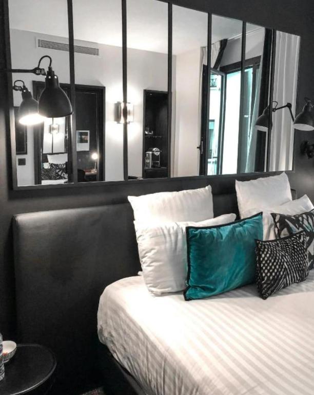 Postel nebo postele na pokoji v ubytování Hotel Loft Near IGI Airport Delhi