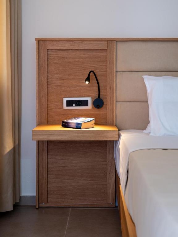 Postel nebo postele na pokoji v ubytování Calypso Hotel