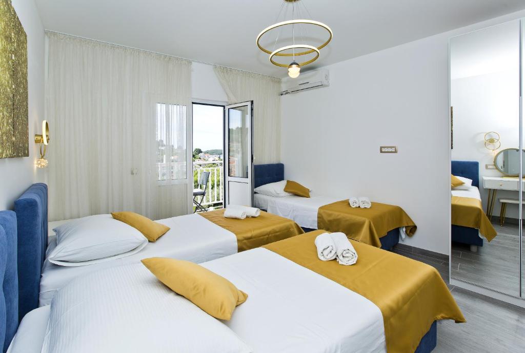 Postel nebo postele na pokoji v ubytování Hostel Villa Zorana