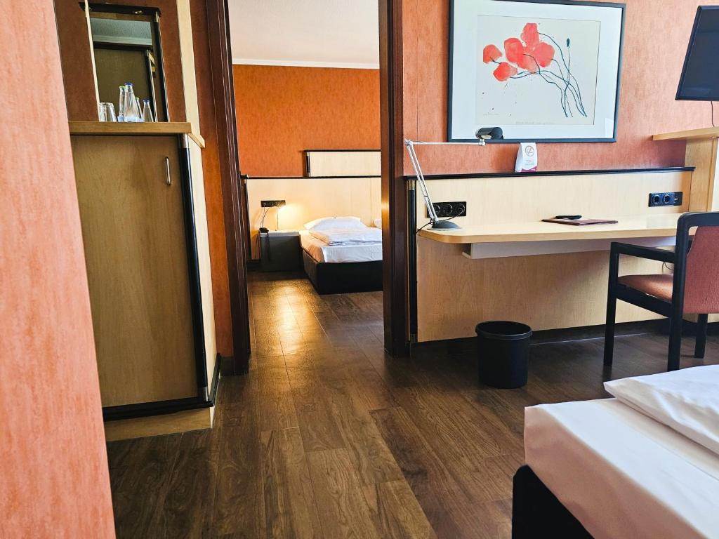 Postel nebo postele na pokoji v ubytování Arvena Park Hotel