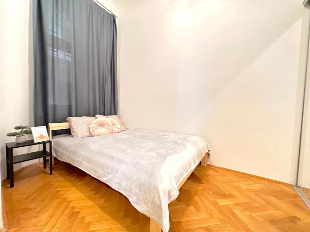 A bed or beds in a room at City Hotel Matyas