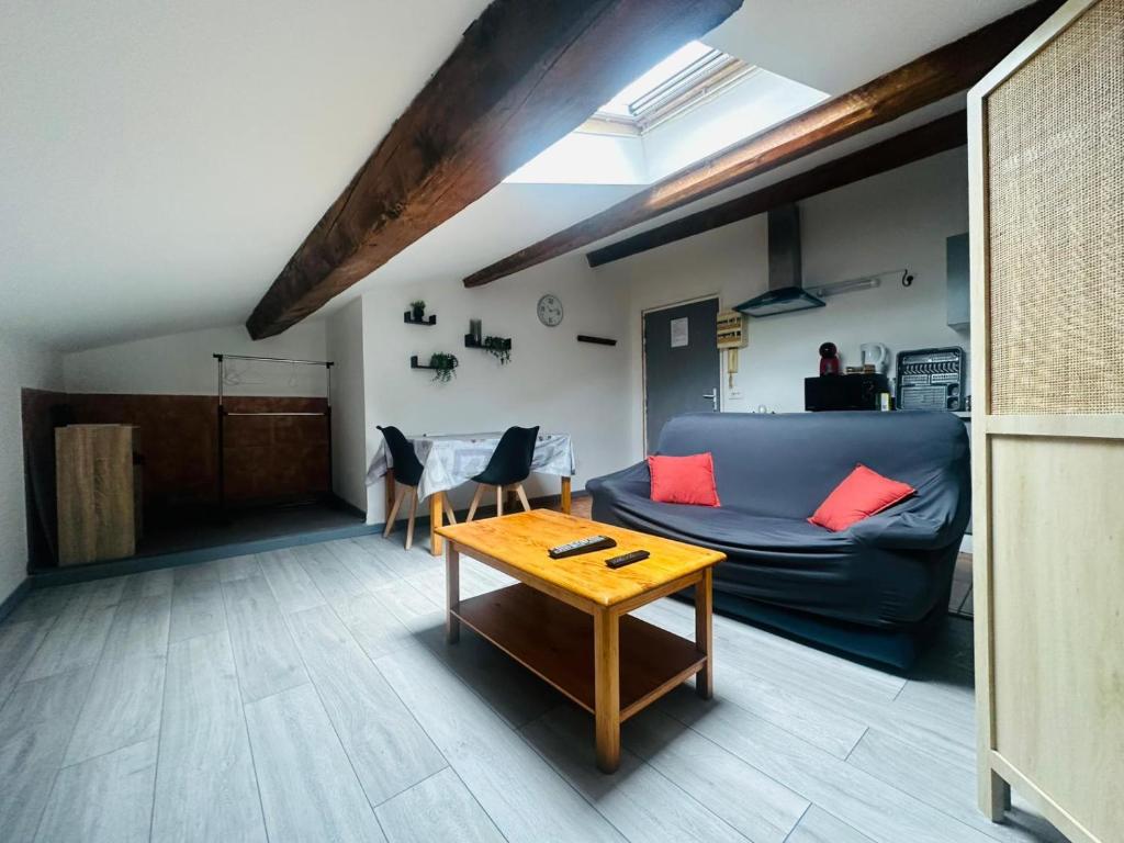 Posezení v ubytování Grand studio proche centre