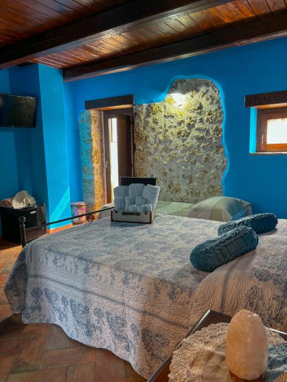Postel nebo postele na pokoji v ubytování Agriturismo Le Faeta