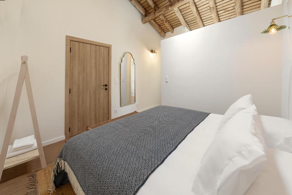 Postel nebo postele na pokoji v ubytování Casa da Rosalina